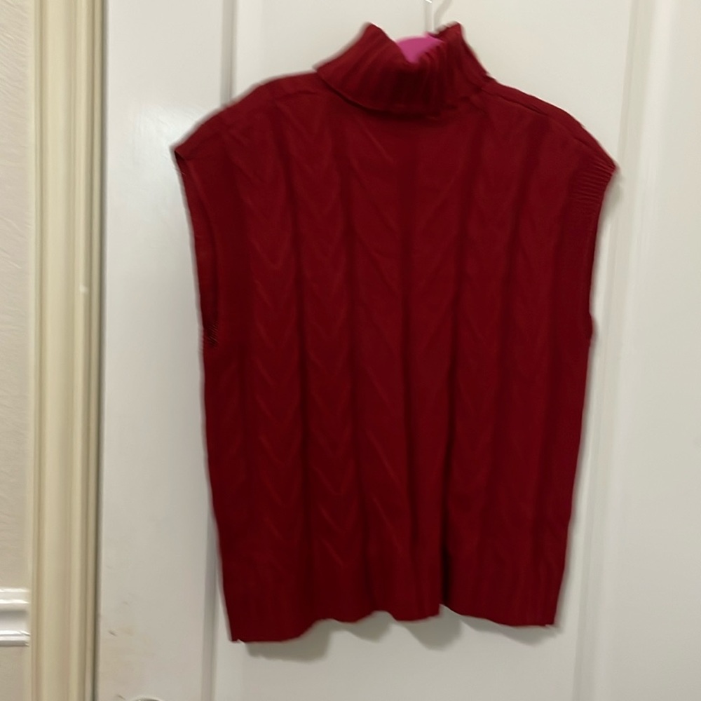 Turtleneck sweater with no sleeves